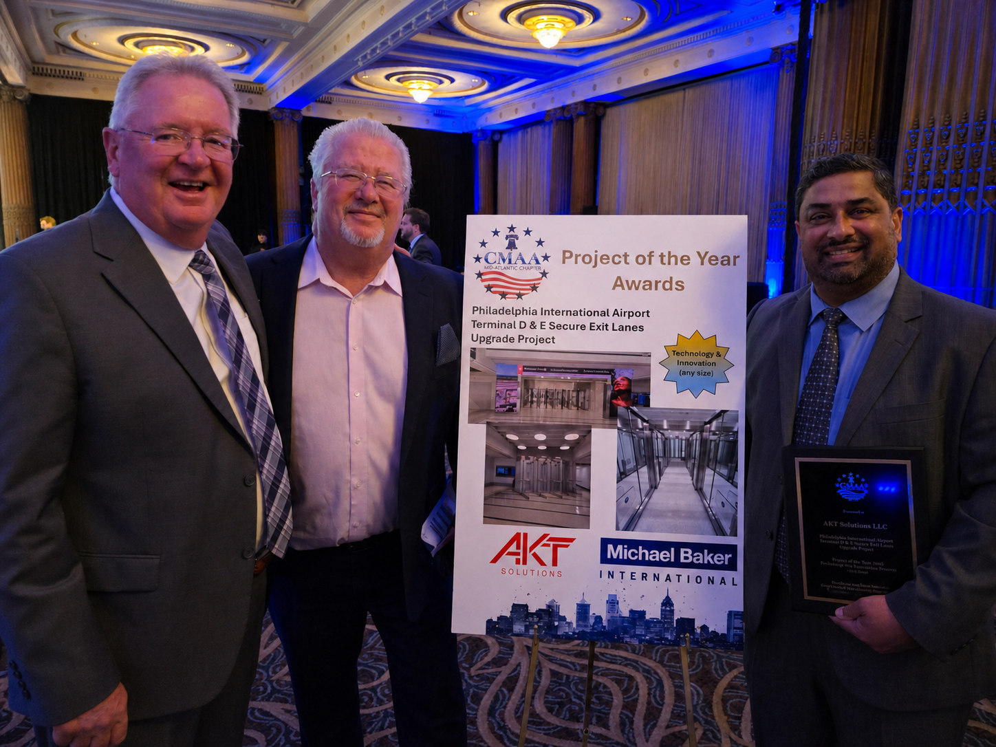 AKT Solutions team receiving CMAA Project of the Year Award